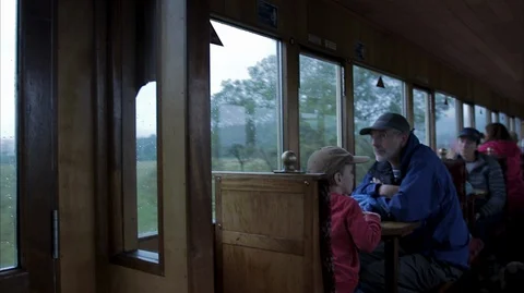 Inside a steam train carriage full of tourists at Snowdon Stock Footage 128417540