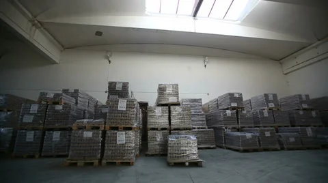 Inside a storage warehouse. Camera moving. Stock Footage 38612308