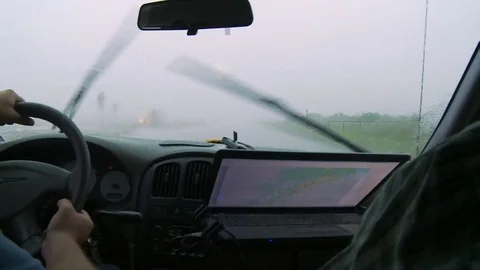 Inside a storm chaser's van on a rainy road Stock Footage 81216404