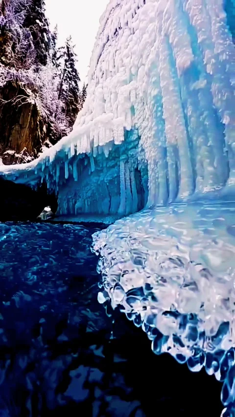 Inside a Stunning Deep Blue Glacial Ice Cave Stock Footage 331505518