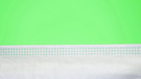 Inside of Surgical Mask on Greenscreen Stock Footage 128467886