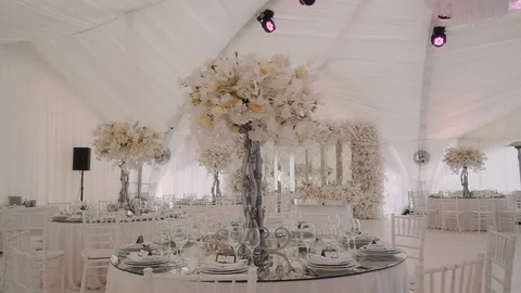 Inside the tent are tables and a decorated table Stock Footage 129463159