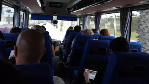 Inside the tourist bus. Point of view of the person who sits in the back seat Stock Footage 110653106