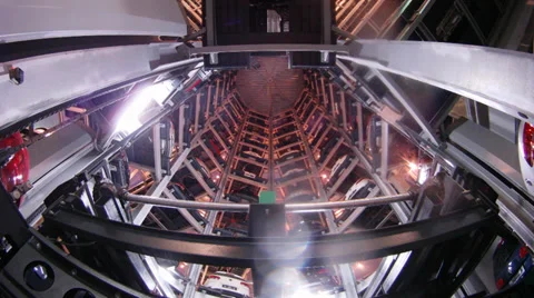 Inside of tower car storage facility, wide view, timelapse 库存影片 28537348