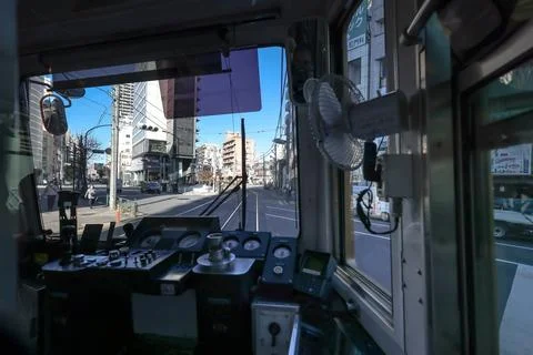Inside a Train Cabin Overlooking Urban Railroad Tracks, Tokyo Dec 6 2024 Stock Photos