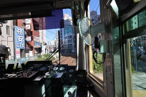Inside a Train Cabin Overlooking Urban Railroad Tracks, Tokyo Dec 6 2024 Stock Photos