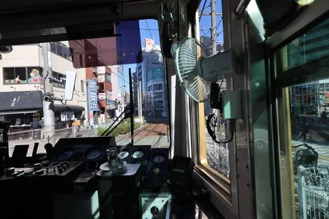 Inside a Train Cabin Overlooking Urban Railroad Tracks, Tokyo Dec 6 2024 Stock Photos