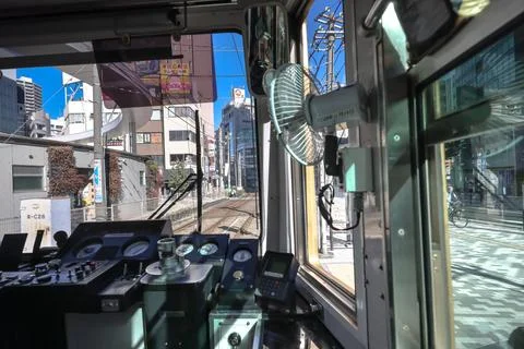 Inside a Train Cabin Overlooking Urban Railroad Tracks, Tokyo Dec 6 2024 Stock Photos