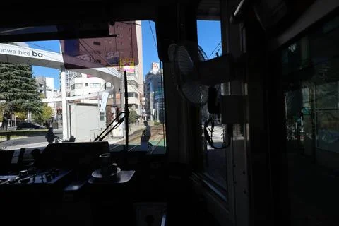 Inside a Train Cabin Overlooking Urban Railroad Tracks, Tokyo Dec 6 2024 Stock Photos