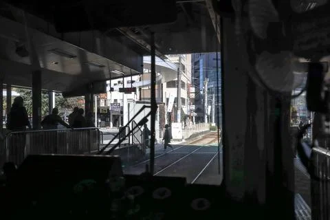 Inside a Train Cabin Overlooking Urban Railroad Tracks, Tokyo Dec 6 2024 Stock Photos