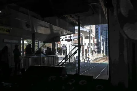 Inside a Train Cabin Overlooking Urban Railroad Tracks, Tokyo Dec 6 2024 Stock Photos