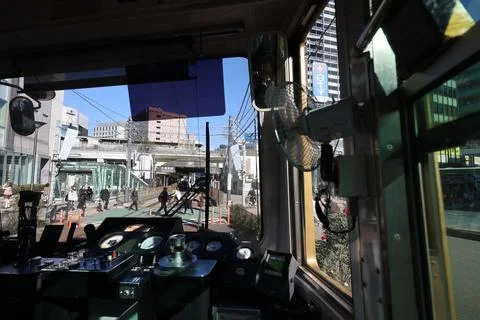 Inside a Train Cabin Overlooking Urban Railroad Tracks, Tokyo Dec 6 2024 Stock Photos
