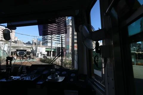 Inside a Train Cabin Overlooking Urban Railroad Tracks, Tokyo Dec 6 2024 Stock Photos