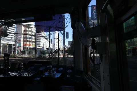 Inside a Train Cabin Overlooking Urban Railroad Tracks, Tokyo Dec 6 2024 Stock Photos