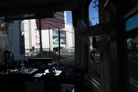 Inside a Train Cabin Overlooking Urban Railroad Tracks, Tokyo Dec 6 2024 Stock Photos