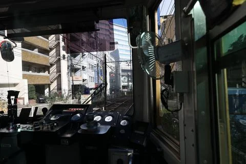 Inside a Train Cabin Overlooking Urban Railroad Tracks, Tokyo Dec 6 2024 Stock Photos