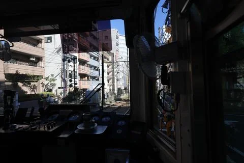 Inside a Train Cabin Overlooking Urban Railroad Tracks, Tokyo Dec 6 2024 Stock Photos