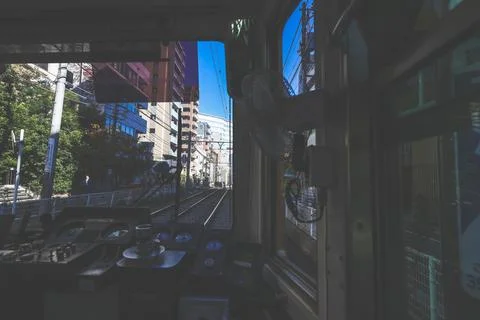 Inside a Train Cabin Overlooking Urban Railroad Tracks, Tokyo Dec 6 2024 Stock Photos