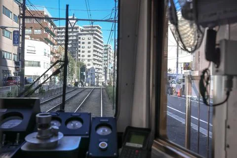 Inside a Train Cabin Overlooking Urban Railroad Tracks, Tokyo Dec 6 2024 Stock Photos