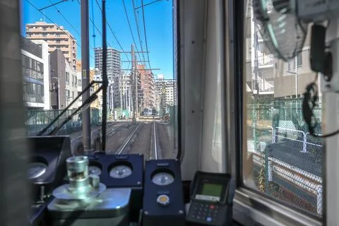 Inside a Train Cabin Overlooking Urban Railroad Tracks, Tokyo Dec 6 2024 Stock Photos