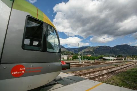 Inside the train cabin with a train driver in operation while driving Stock Photos