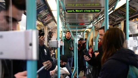 Inside of train car going to London city airport Stock Footage 126297739