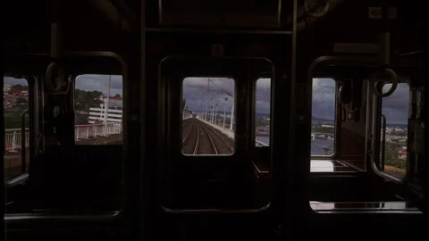 Inside a Train Car Looking Out Through Windows at Rails, Vintage Film Stock Footage 318623027
