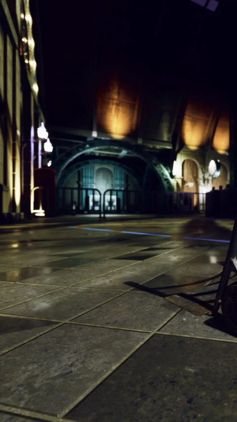 Inside a train station during evening with light reflections on the floor Stock Footage 332207169