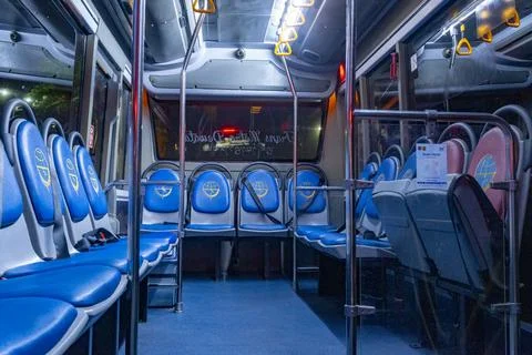 Inside Trans Metro Dewata Bus with blue seats Stock Photos