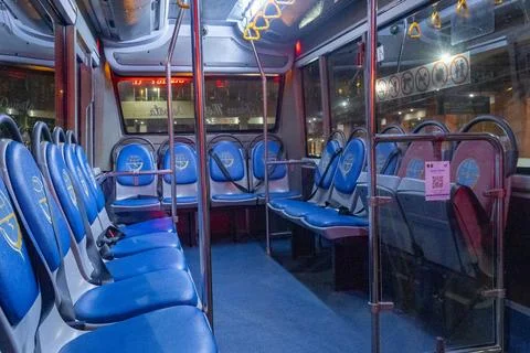 Inside Trans Metro Dewata Bus with blue seats Stock-Fotos
