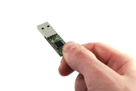 Inside usb structure in hand. Exposed circuit of Usb flash drive Stock Photos