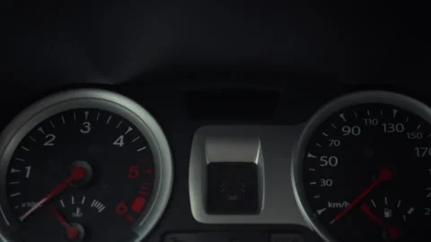 Inside the vehicle the drivers hand switches off the hazard signal mode on t Stock Footage 331354156