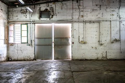 Inside view of an abandoned warehouse Stock Illustration
