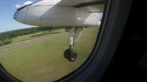 Inside view of an airplane's wheel as it lands Stock Footage 8960152