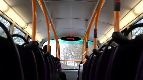 Inside view of bus and street travelling in town in England Видео 170568014