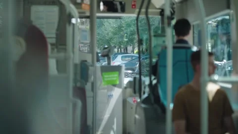 Inside view of bus with driver driving responsibly through the city of France. Video stock 301576041