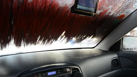 Inside view of a car being washed on an automatic machine. Car wash from inside  Stock Footage 116565018