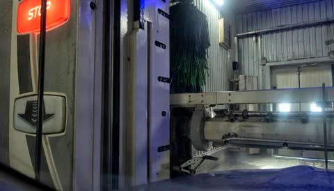 Inside view of a car being washed on an automatic machine. Stock Photos
