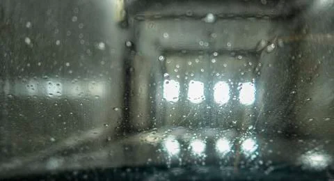 Inside view of a car being washed on an automatic machine. Stock Photos