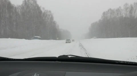 Inside view from car to winter road at blizzard POV Stock-Footage 47962839