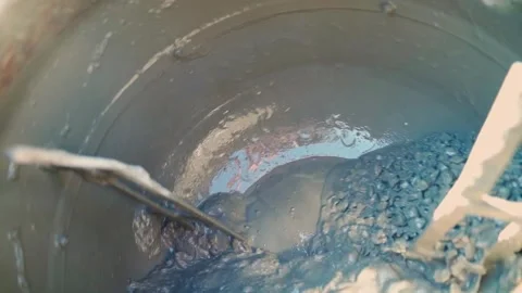 Inside view, concrete mixer rotating in slow motion Stock Footage 311973223