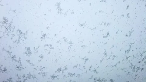 Inside view of the front windshield of a car with wet snow Stock Footage 172363799