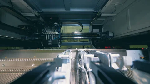 Inside view of a functioning machine used for producing circuits 動画素材 102580650