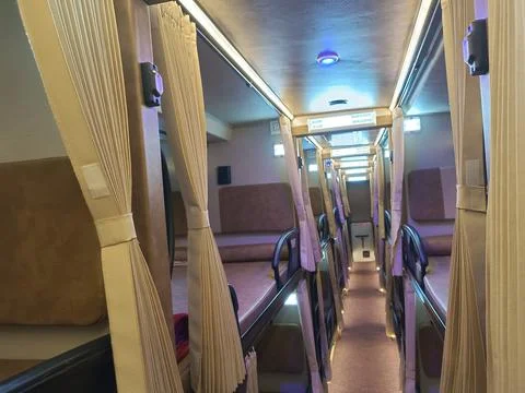 Inside view of a luxury sleeper bus for long route in India 写真素材