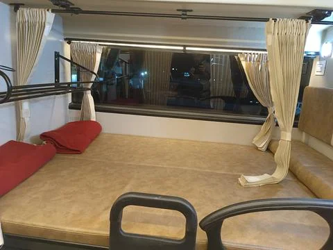 Inside view of a luxury sleeper bus for long route in India Stock-Fotos
