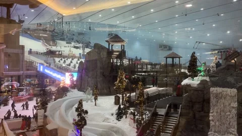 Inside view of Mall of the Emirates winter themed sky resort entertainment in Stock Footage 327413576