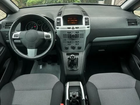 Inside view of a modern car showcasing sleek design and functional controls.. 스톡 사진