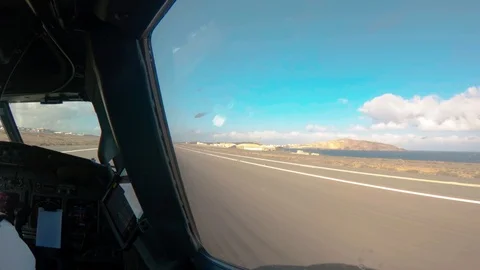 Inside view out of the cockpit of a aircraft during takeoff. Stock Footage 97241323