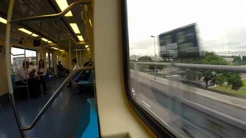 Inside view of passengers in the wagon and traveling along of city Video stock 86532360