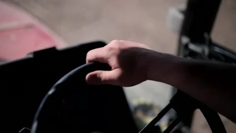 Inside view of a seeder tractor in an agrarian field. Tilling the land in an agr Stock Footage 224952826